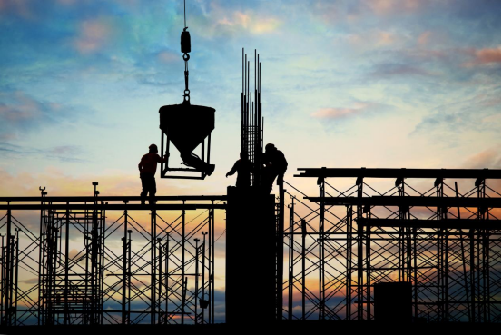 Several workers are installing steel bars and other equipment needed for construction