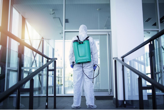 People wearing protective clothing are performing sterilization and disinfection work